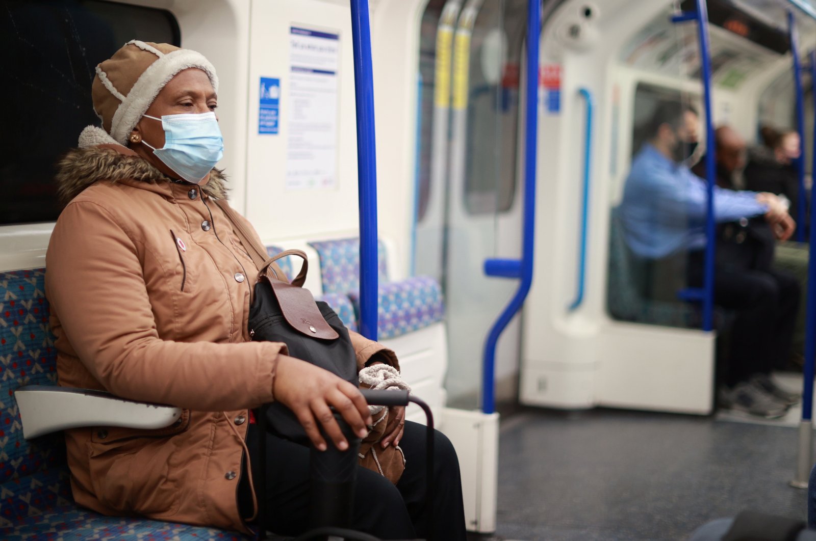 A person wears a face mask on the underground, as the spread of COVID-19 continues in London, U.K., Nov. 30, 2021. (Reuters Photo)