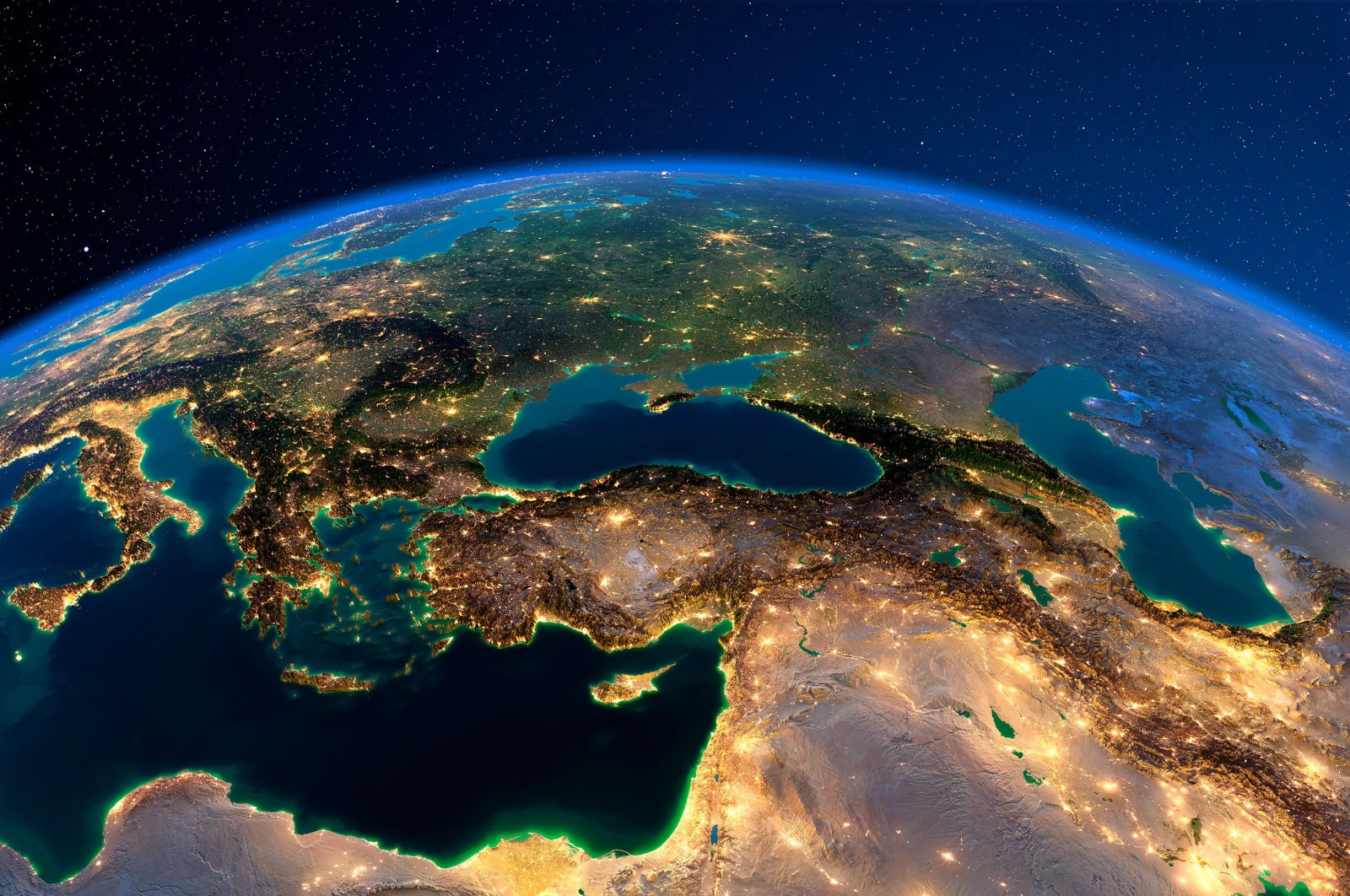 Planet Earth is lit by the lights of large cities, with Turkey seen at the center. (Photo by Shutterstock)