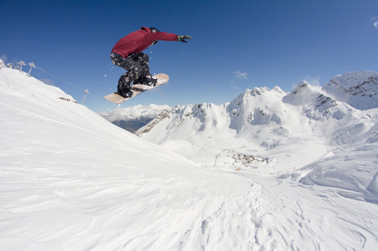 Unlike the infamous knee injuries of downhill skiers, snowboarders typically injure their shoulders, arms and hands. (Shutterstock Photo) 