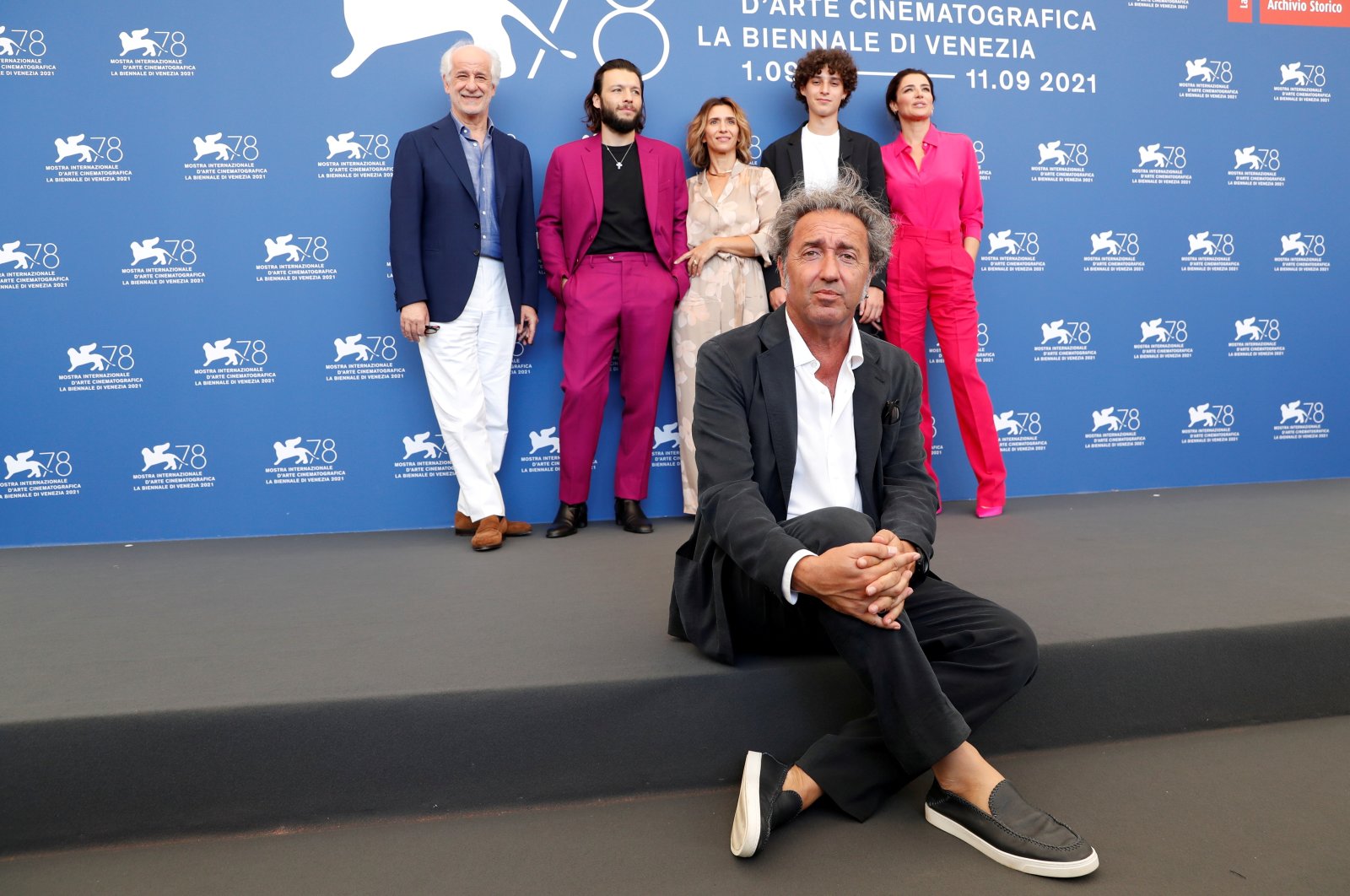 Director Paolo Sorrentino and actors Toni Servillo, Marlon Joubert, Teresa Saponangelo, Filippo Scotti and Luisa Ranieri pose at the 78th Venice Film Festival, Venice, Italy, Sept. 2, 2021. (REUTERS)