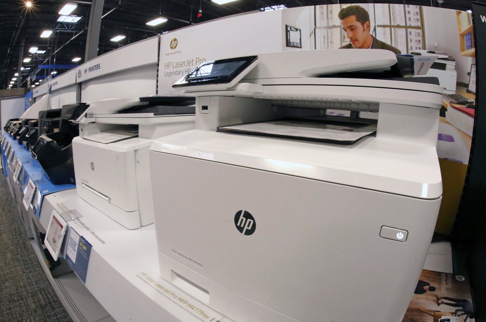 Hewlett-Packard printers on display in a Best Buy store in Pittsburgh, Feb. 22, 2018. (AP Photo)