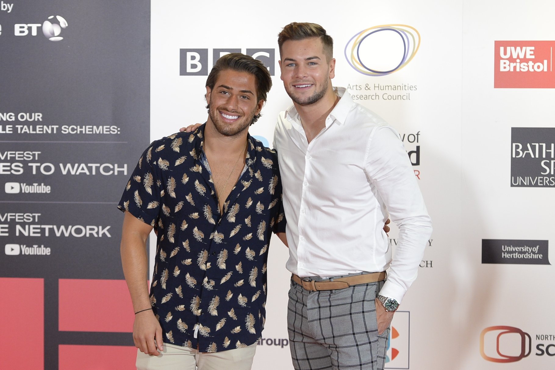 Stars of the hit TV show Love Island 2017, Kem Çetinay (L) and Chris Hughes, on the opening day of the Edinburgh International Television Festival, on Aug. 22, 2018, in Edinburgh, Scotland. (Getty Images,)