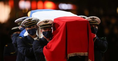 Six personnel of the Air and Space Force carry the cenotaph of Josephine Baker (1906-1975) to the Pantheon in Paris, France, Nov. 30, 2021. (EPA)