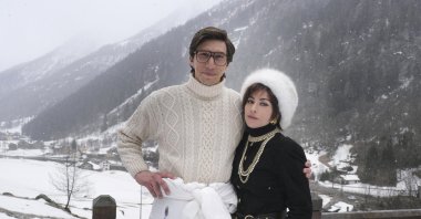 This image released by MGM shows Adam Driver as Maurizio Gucci, left, and Lady Gaga as Patrizia Reggiani in &quot;House of Gucci.&quot; (AP)