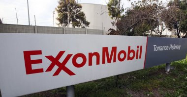 The sign for the ExxonMobil Torrance Refinery in Torrance, California, U.S., Jan. 30, 2012. (AP Photo)