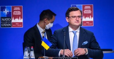 Ukraine's Foreign Minister Dmytro Kuleba (R) attends a session of a NATO Foreign Ministers meeting with Georgia and Ukraine on December 1, 2021 in Riga, Latvia. (AFP Photo)