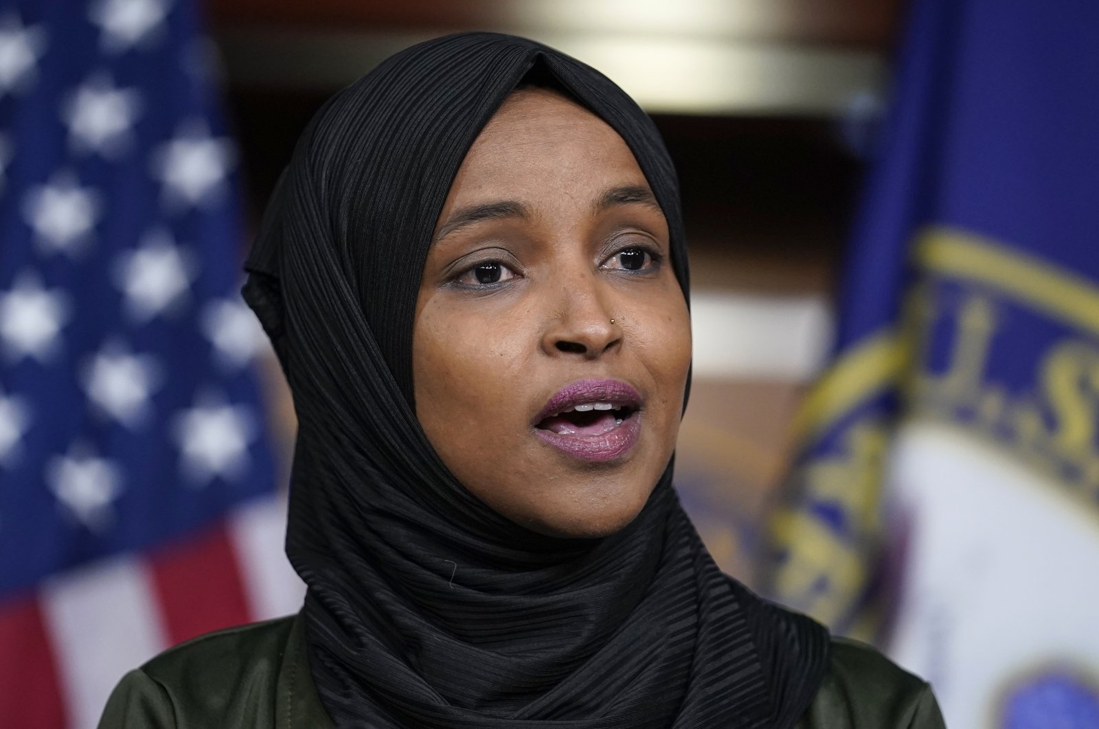 Rep. Ilhan Omar, D-Minnesota, speaks to reporters in the wake of anti-Islamic comments made last week by Rep. Lauren Boebert, R-Colorado, who likened Omar to a bomb-carrying terrorist, during a news conference at the Capitol in Washington, U.S., Nov. 30, 2021. (AP Photo)