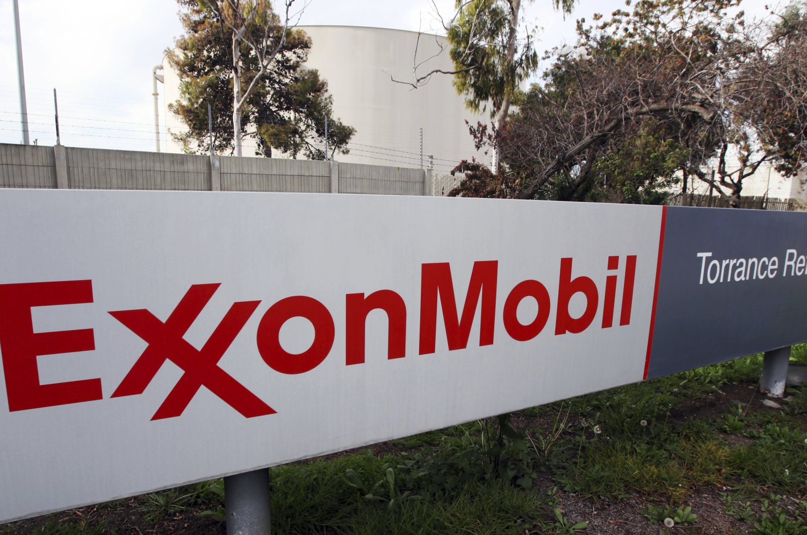 The sign for the ExxonMobil Torrance Refinery in Torrance, California, U.S., Jan. 30, 2012. (AP Photo)