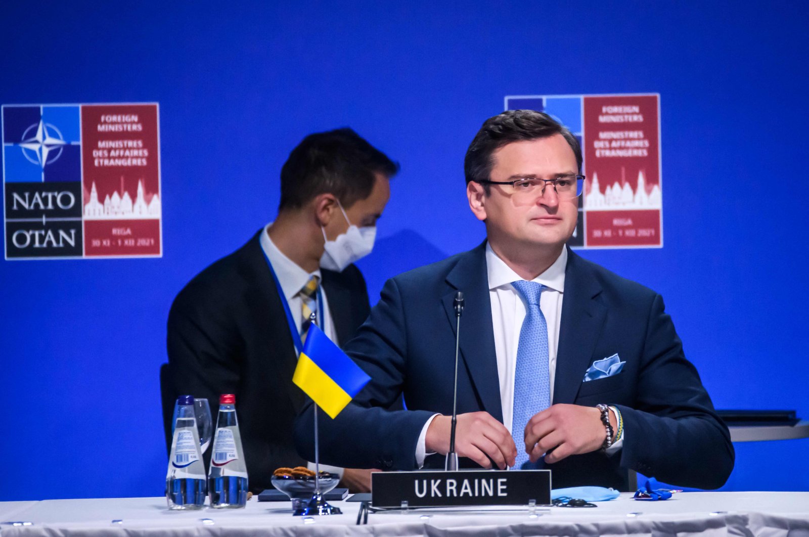 Ukraine&#039;s Foreign Minister Dmytro Kuleba (R) attends a session of a NATO Foreign Ministers meeting with Georgia and Ukraine on December 1, 2021 in Riga, Latvia. (AFP Photo)
