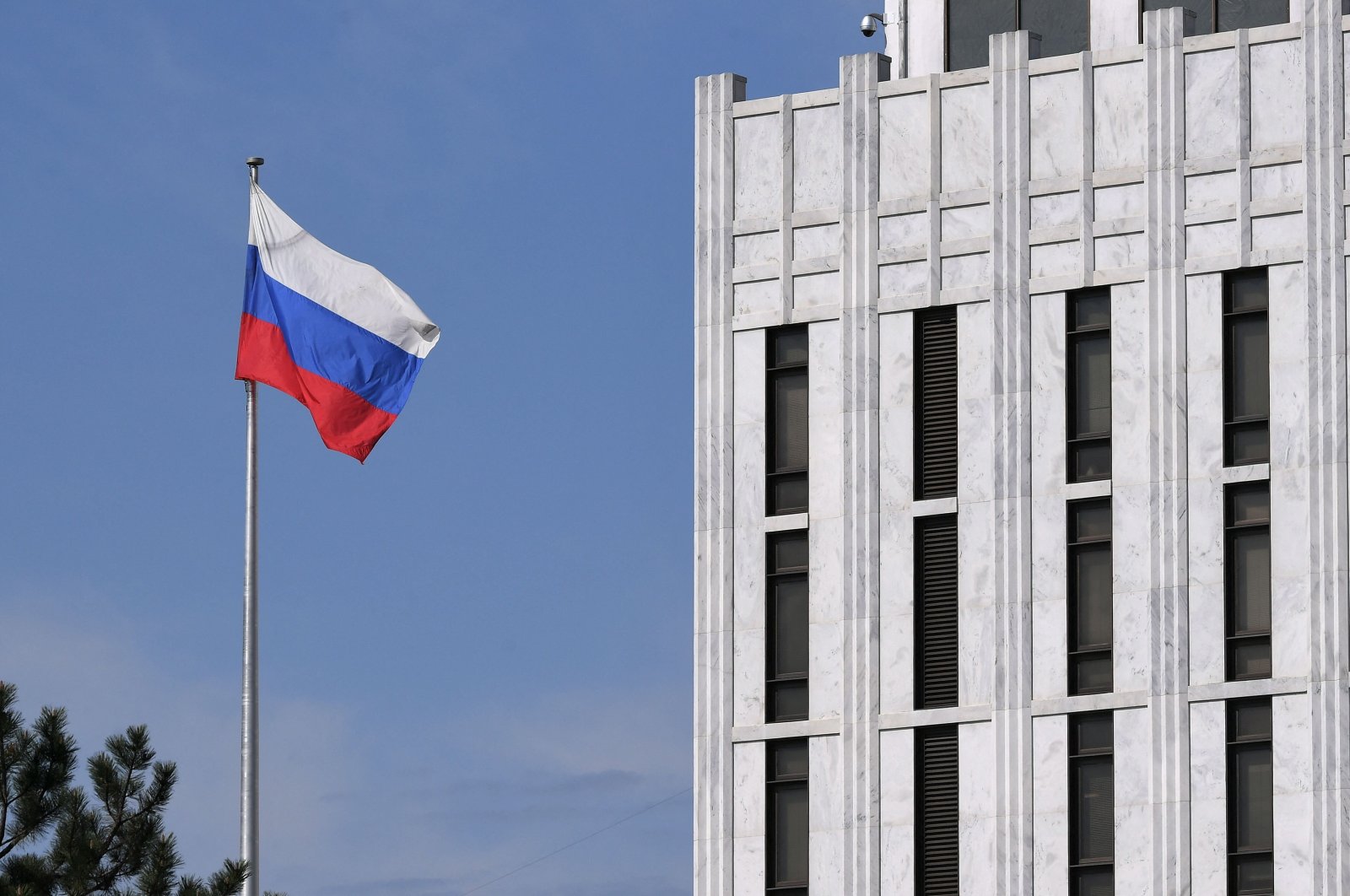 The Russian flag flutters at the embassy&#039;s compound in Washington, D.C., U.S., April 15, 2021. (AFP Photo)