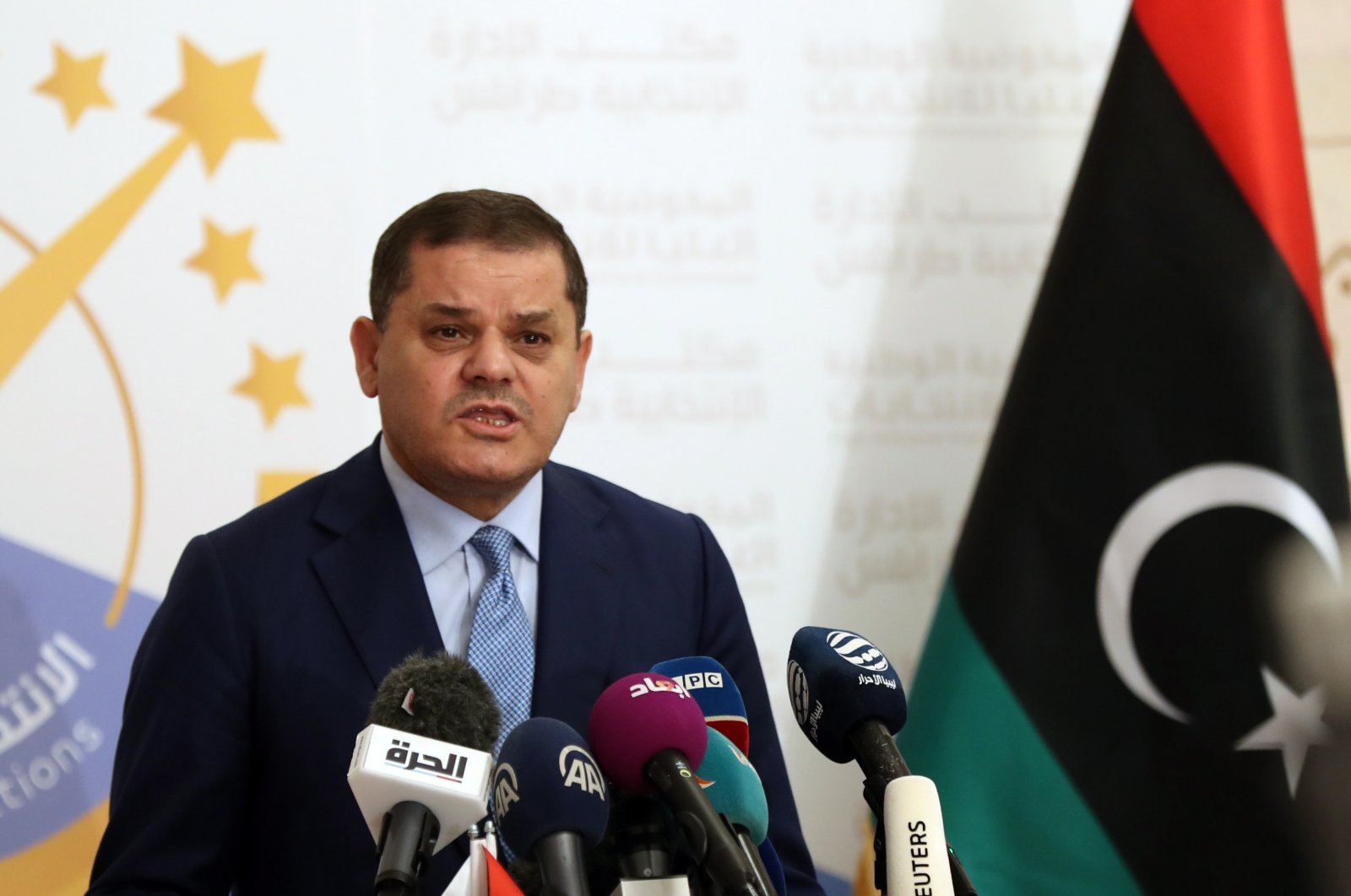 Libyan Prime Minister Abdul Hamid Dbeibah speaks after submitting his candidacy papers for the upcoming presidential election at the headquarters of the electoral commission in Tripoli, Libya, Nov. 21, 2021. (EPA Photo)