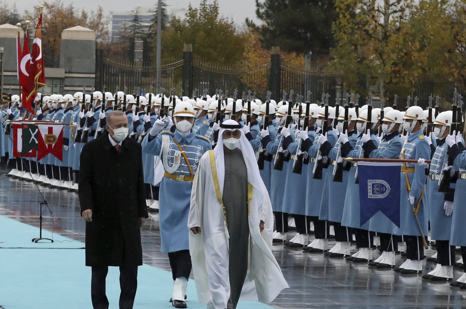 President Recep Tayyip Erdoğan (L) and Crown Prince Sheikh Mohammed bin Zayed Al Nahyan (MBZ) of the United Arab Emirates review a military honor guard during a welcoming ceremony at the presidential palace, in Ankara, Turkey, Nov. 24, 2021. (AP Photo)