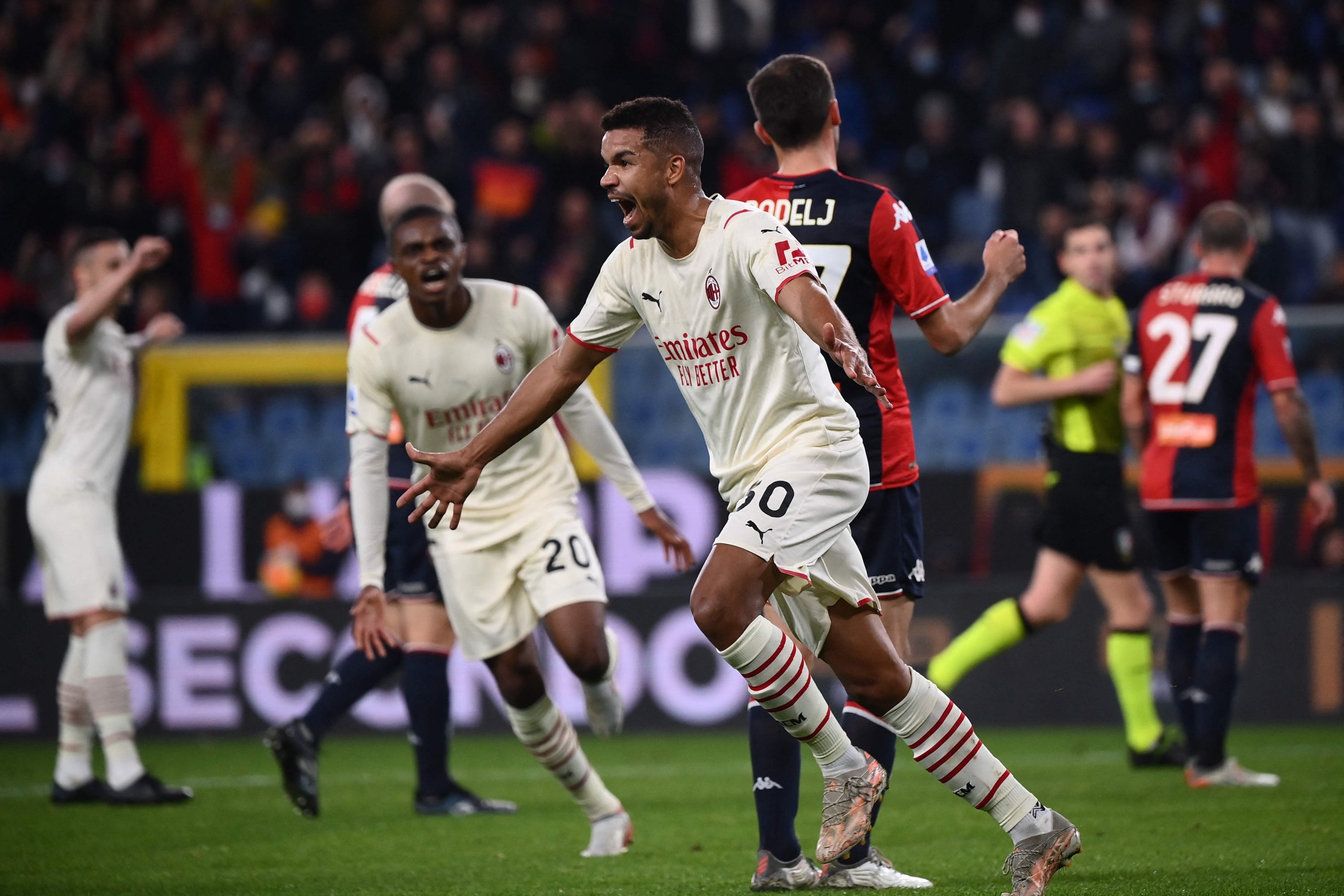 AC Milan's Brazilian midfielder Junior Messias (C) celebrates after scoring in a Serie A match against Genoa, Genoa, Italy, Dec. 01, 2021. (AFP Photo)