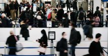 Travelers arrive for flights at Newark Liberty International Airport in Newark, New Jersey, U.S., Nov. 30, 2021. (AFP Photo)