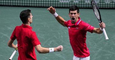 Serbia's Nikola Cacic (L) and Novak Djokovic celebrate their Davis Cup quarterfinal doubles victory over Kazakhstan, Madrid, Spain, Dec. 1, 2021. (AP Photo)