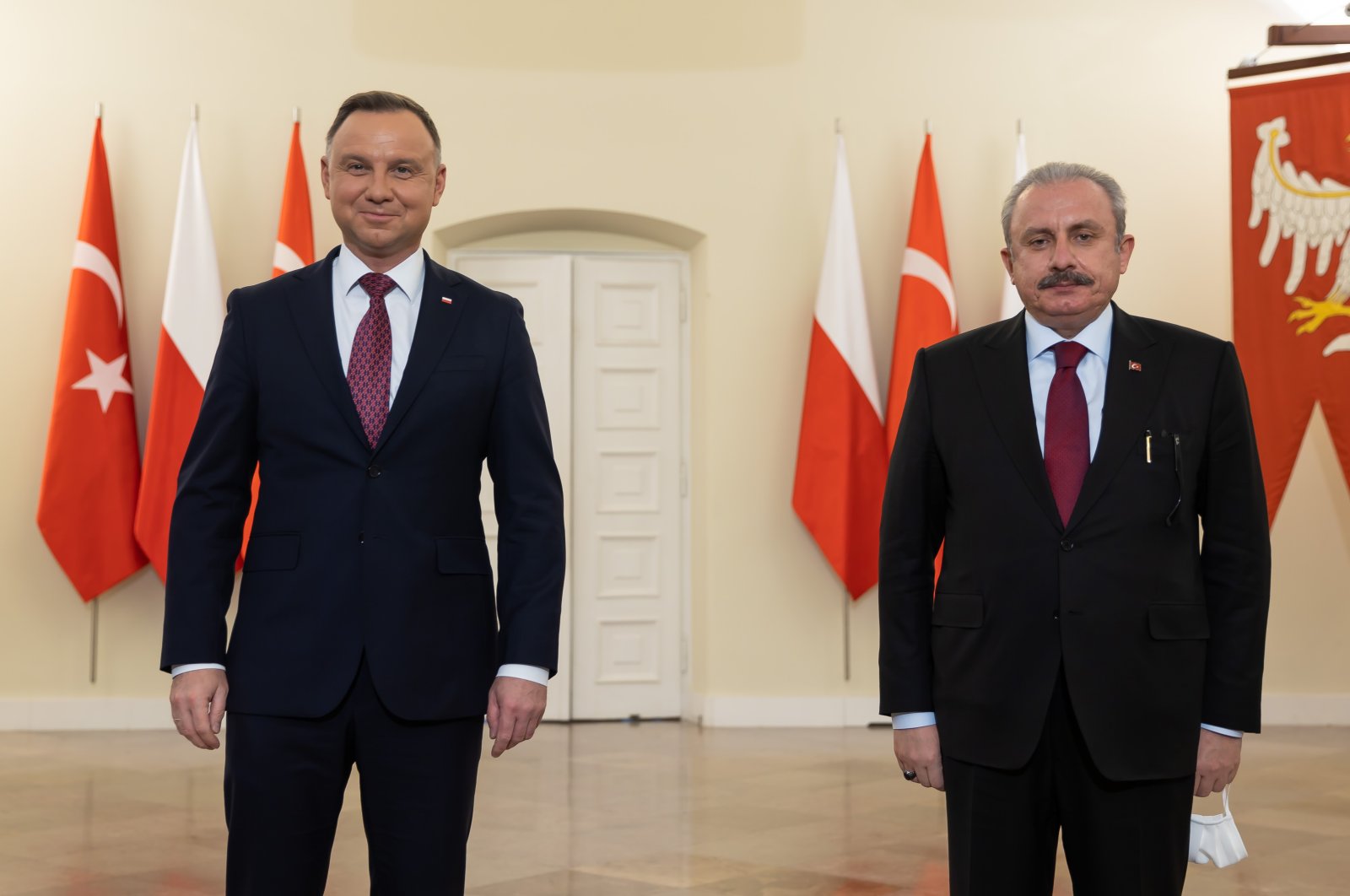 Parliament Speaker Mustafa Şentop (R) is received by Polish President Andrzej Duda in Warsaw, Poland, Dec.1, 2021. (AA Photo)