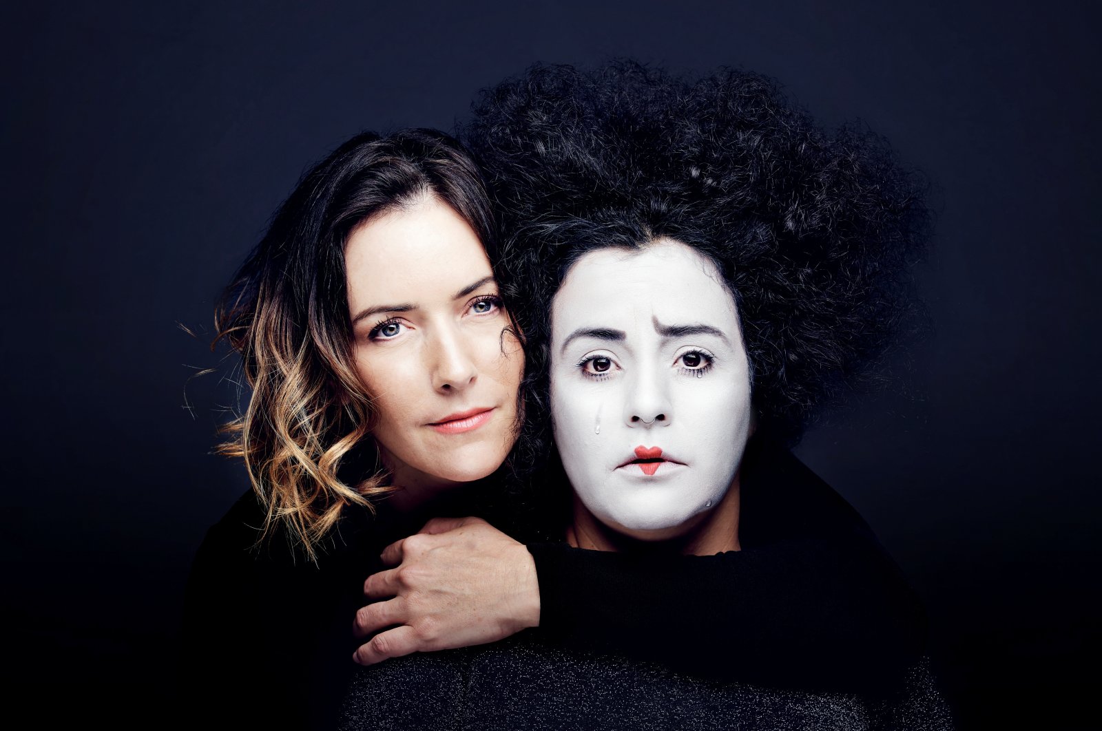 Conductor Alondra de la Parra and clown performer Gabriela Munoz pose for a promotional picture for &quot;The Silence of Sound&quot; in La Bisbal d&#039;Emporda, Spain on Aug. 17, 2021. (REUTERS)