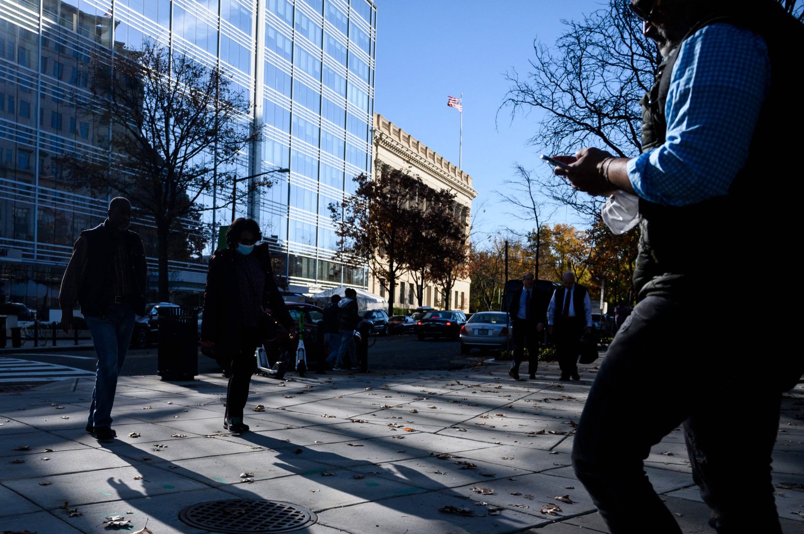 People walk on the streets in downtown Washington, D.C., U.S., Nov. 18, 2021. (AFP Photo)