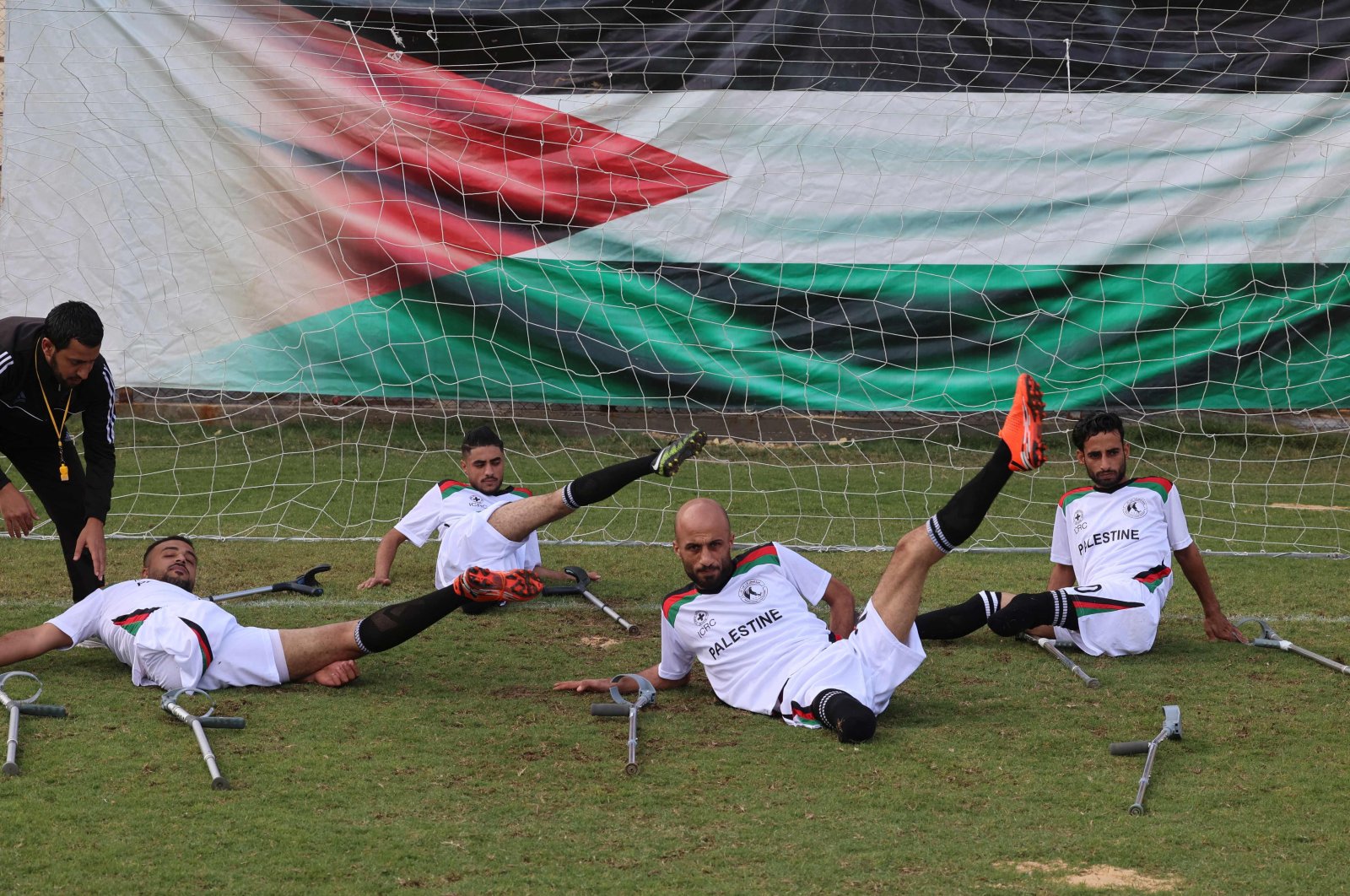 Palestinian players with disabilities, part of a football team organized by the International Committee of the Red Cross (ICRC), take part in a training session in Gaza City, the Gaza Strip, Palestine, Dec. 2, 2021. (AFP Photo)