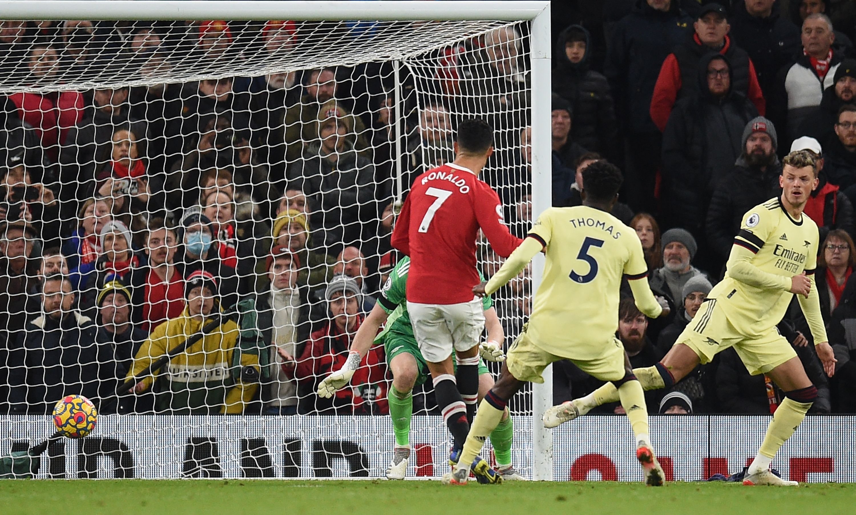 Manchester United's Portuguese striker Cristiano Ronaldo (C) shoots to score the team's second goal, his 800th for the club and the country in his career, during the English Premier League football match against Arsenal at Old Trafford in Manchester, England, Dec. 2, 2021. (AFP Photo)