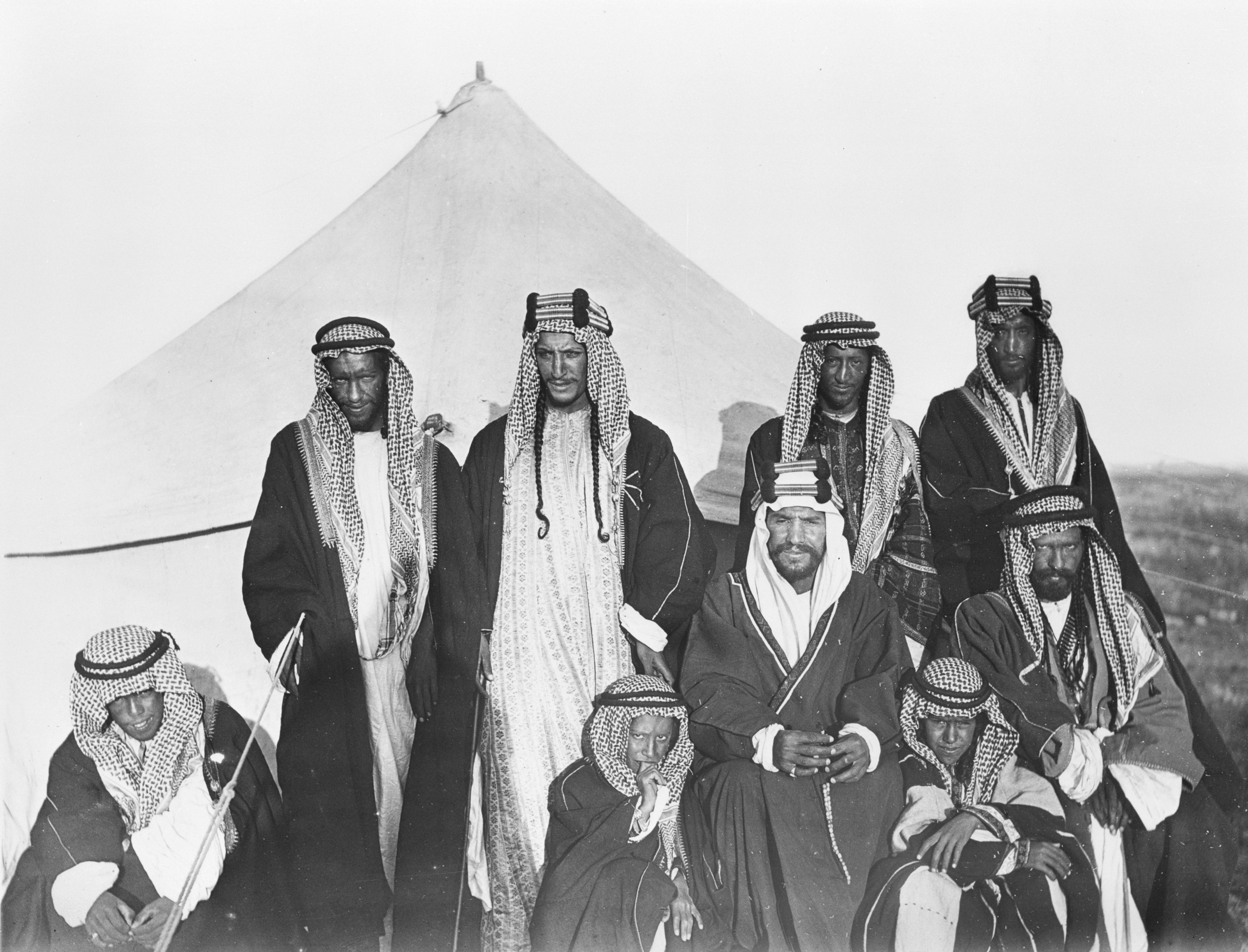Abdulaziz bin Abdul Rahman Al Saud, standing second from left, with brothers and sons near Thaj, Saudi Arabia, photographed by British envoy Captain William Shakespear, March 11, 1911. (Getty Images)