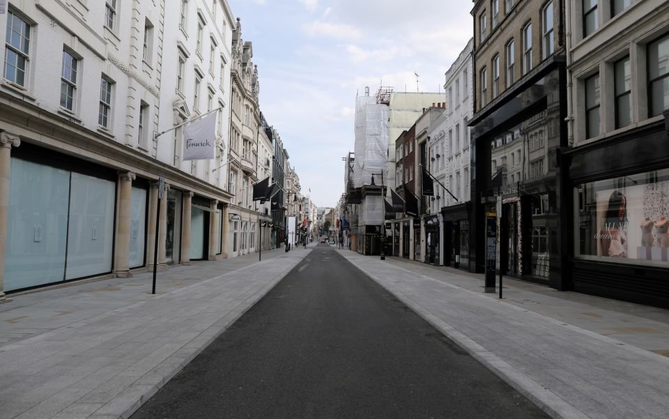 General view of the deserted New Bond Street with its closed shops, following the outbreak of the coronavirus disease, London, United Kingdom, May 7, 2020. (Reuters Photo) 