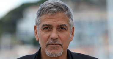 U.S. actor George Clooney poses during a photocall for the film "Money Monster" at the 69th Cannes Film Festival in Cannes, southern France, May 12, 2016. (AFP Photo)