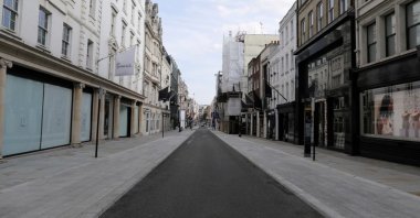 General view of the deserted New Bond Street with its closed shops, following the outbreak of the coronavirus disease, London, United Kingdom, May 7, 2020. (Reuters Photo) 