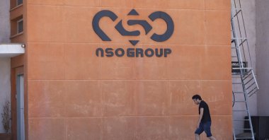 A logo adorns a wall on a branch of the Israeli NSO Group company, near the southern town of Sapir, Israel, Aug. 24, 2021. (AP Photo)