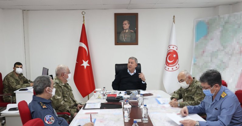 Defense Minister Hulusi Akar speaks with top commanders of the navy, ground and air forces during military inspections in the southern province of Hatay, Turkey, Dec. 3, 2021. (AA Photo)