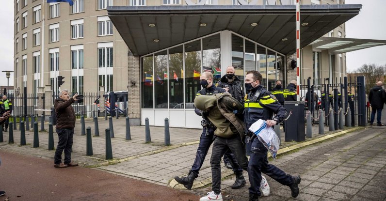 A group of protesters stormed a building on Johan de Wittlaan in The Hague, Netherlands, Dec. 3, 2021. (EPA Photo)