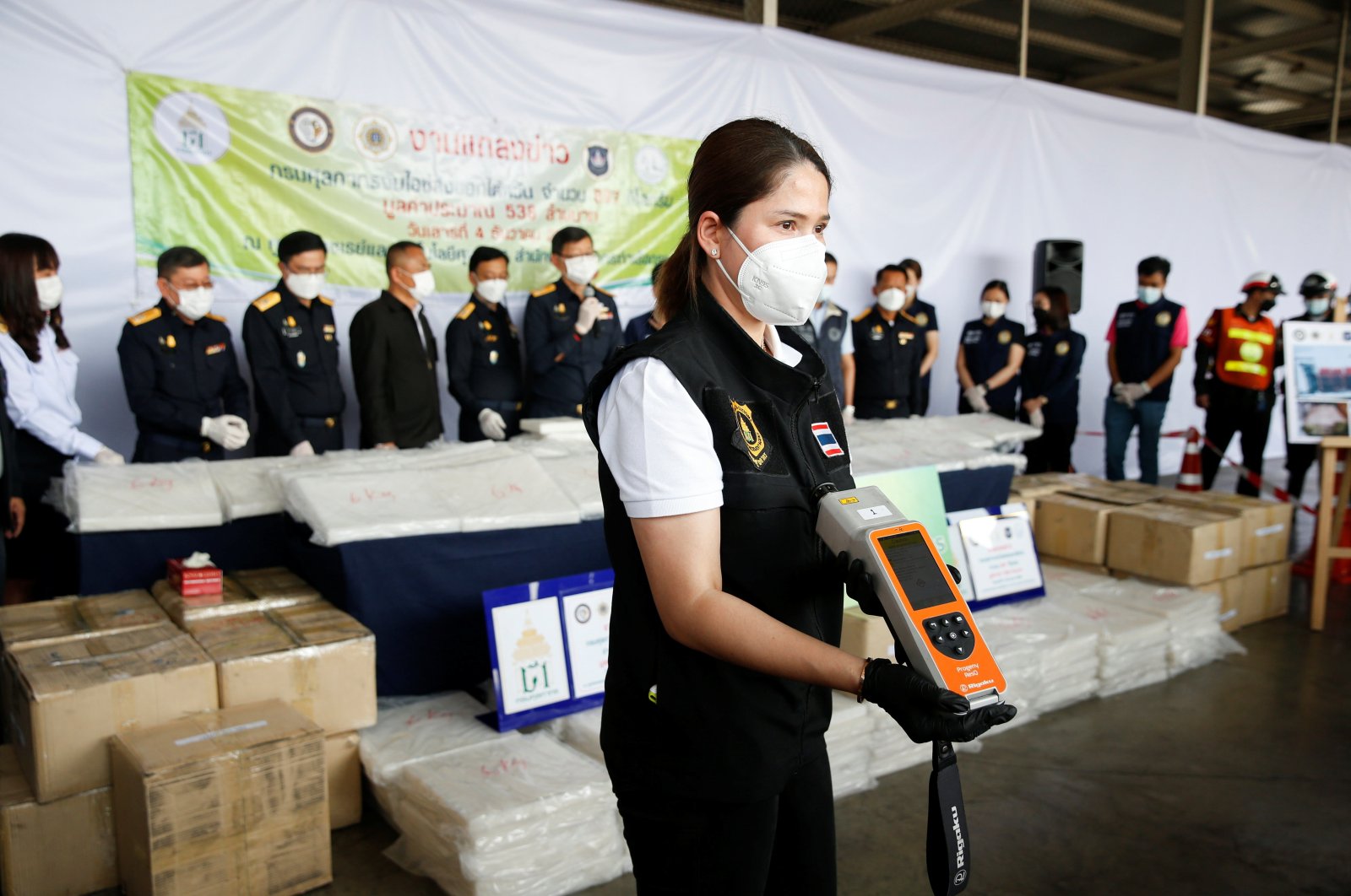 Thai authorities show the result of machine test as they seized 897 kilograms of crystal methamphetamine worth 2.7 billion baht ($79,733,079) after Thai customs intercepted packages headed for Taiwan, in Bangkok, Thailand, Dec. 4, 2021. (Reuters Photo)