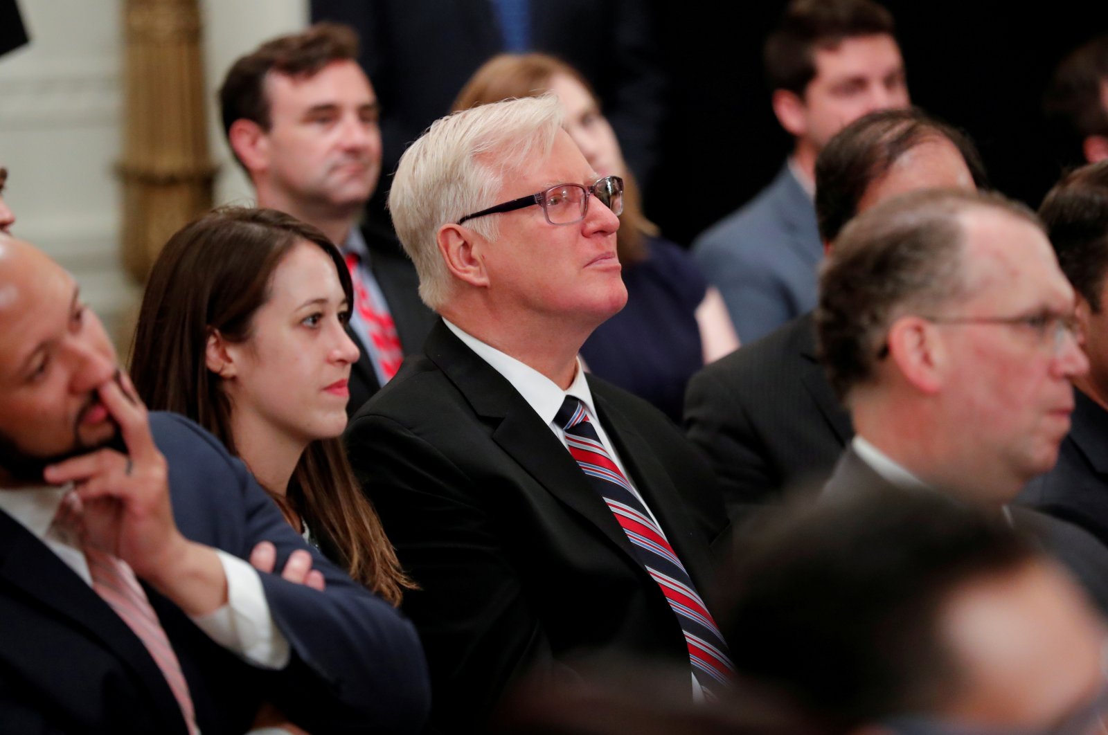 Gateway Pundit publisher Jim Hoft listens as U.S. President Donald Trump speaks during a "social media summit" meeting with prominent conservative social media figures in the East Room of the White House in Washington, U.S., July 11, 2019. (Reuters Photo)