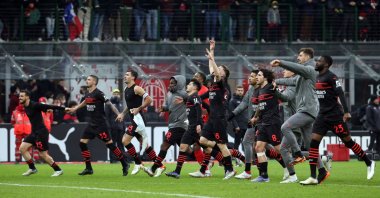 AC Milan players celebrate their win in a Serie A match against Salernitana, Milan, Italy, Dec. 4, 2021. (EPA Photo)