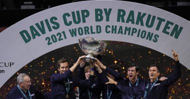 The Russian Tennis Federation team celebrate with the trophy after winning the Davis Cup tennis final at the Madrid Arena in Madrid, Spain, Dec. 5, 2021. (AP Photo)