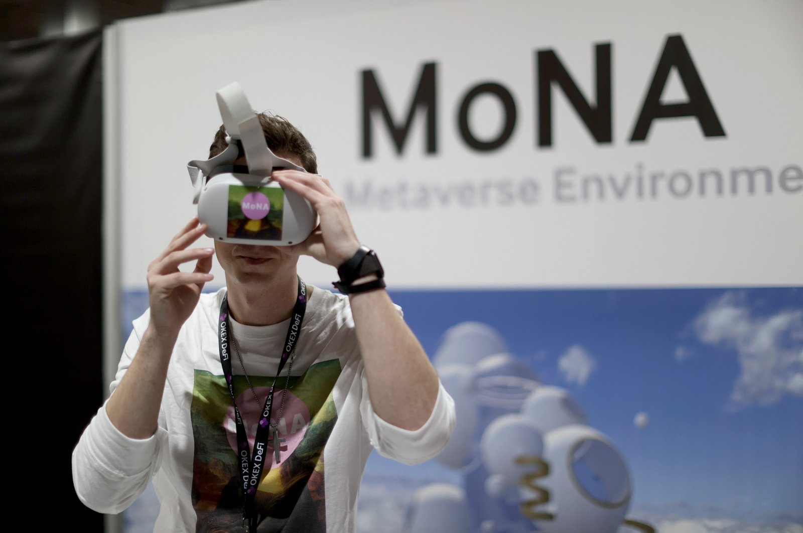 A man wears a VR headset during the DCentral Miami conference at the Miami Airport Convention Center, in Miami, Florida, U.S., Dec. 1, 2021. (AFP Photo)