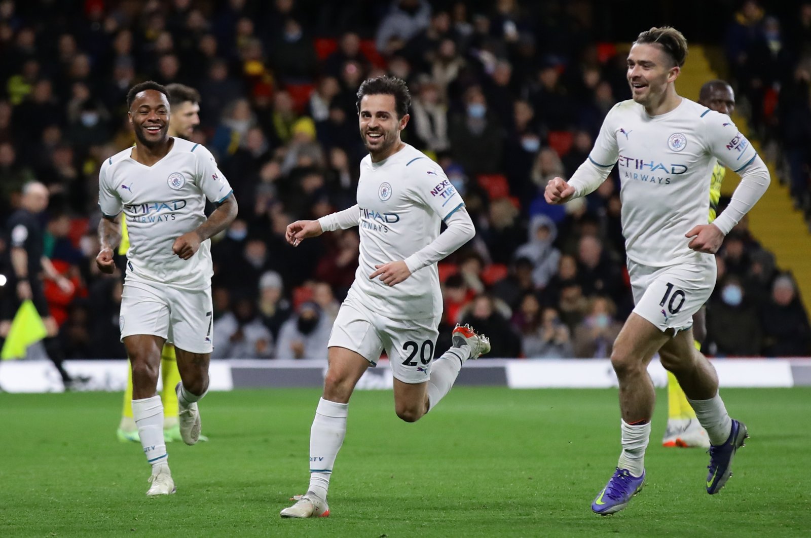 Manchester City&#039;s Bernardo Silva celebrates a goal with Jack Grealish and Raheem Sterling in a Premier League match against Watford, Vicarage Road, Watford, England, Dec. 4, 2021. (Reuters Photo)