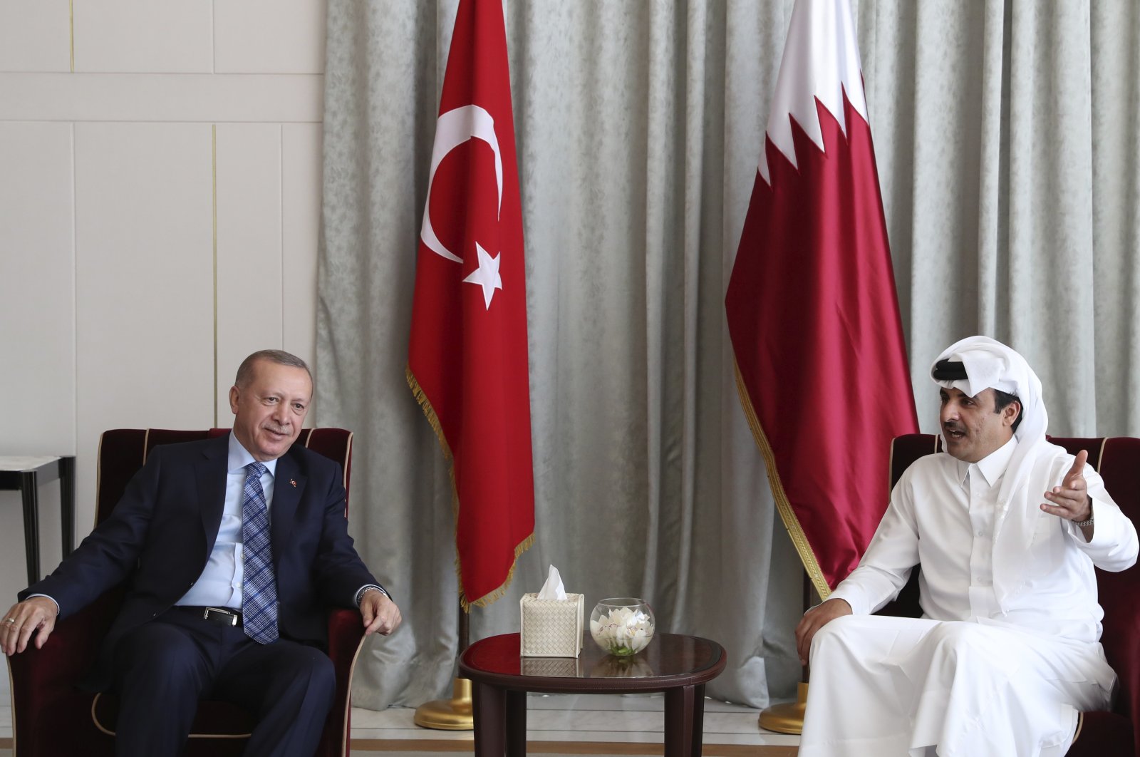 President Recep Tayyip Erdoğan (L) speaks with Emir of Qatar Sheikh Tamim bin Hamad Al Thani, in Doha, Qatar, Thursday, July 2, 2020. (Presidential Press Service via AP, Pool)