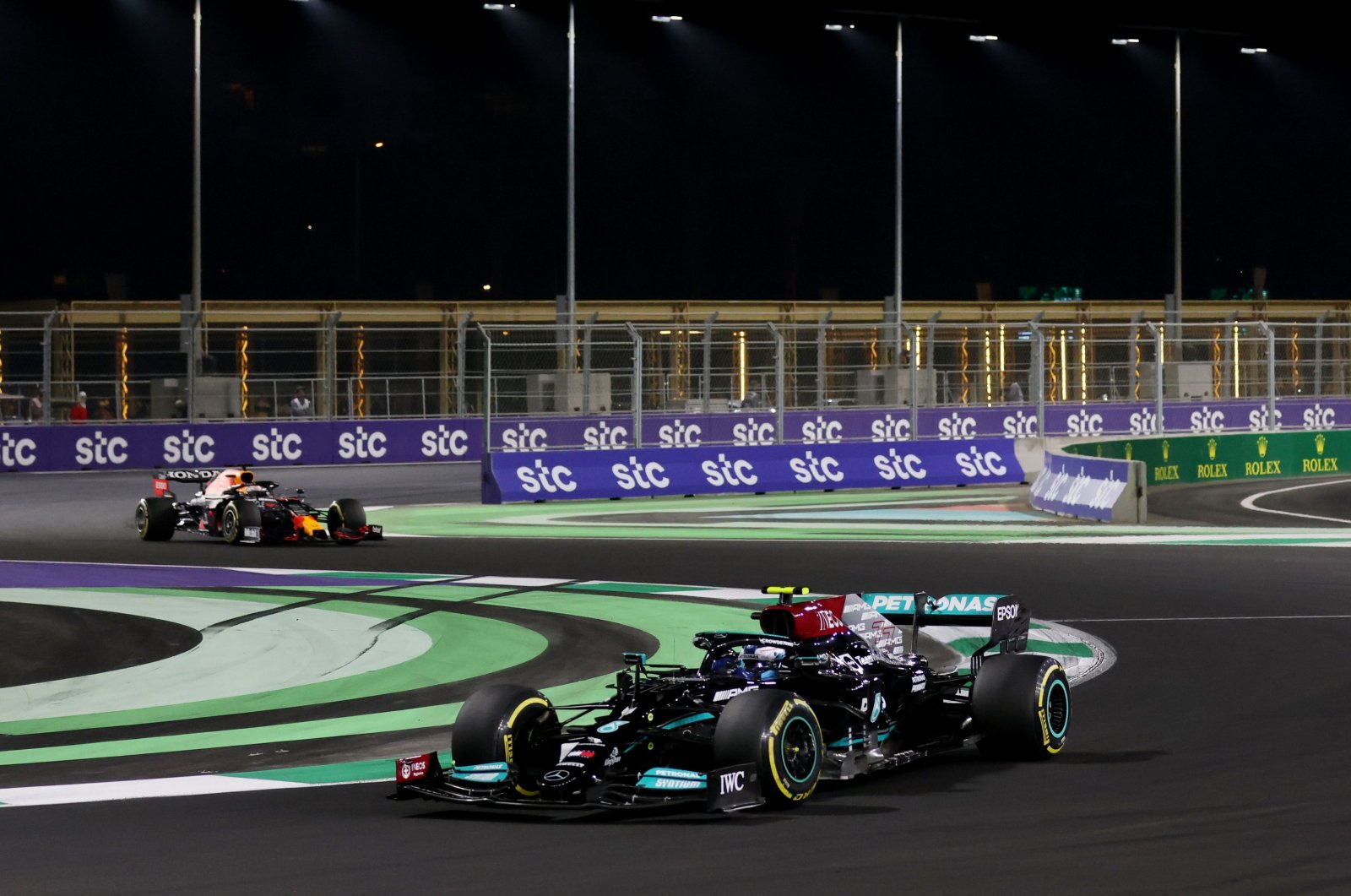Mercedes&#039; Valtteri Bottas in action with Red Bull&#039;s Max Verstappen during Formula One F1 Saudi Arabian Grand Prix, Jeddah Corniche Circuit, Jeddah, Saudi Arabia, Dec. 5, 2021. (Reuters Photo)