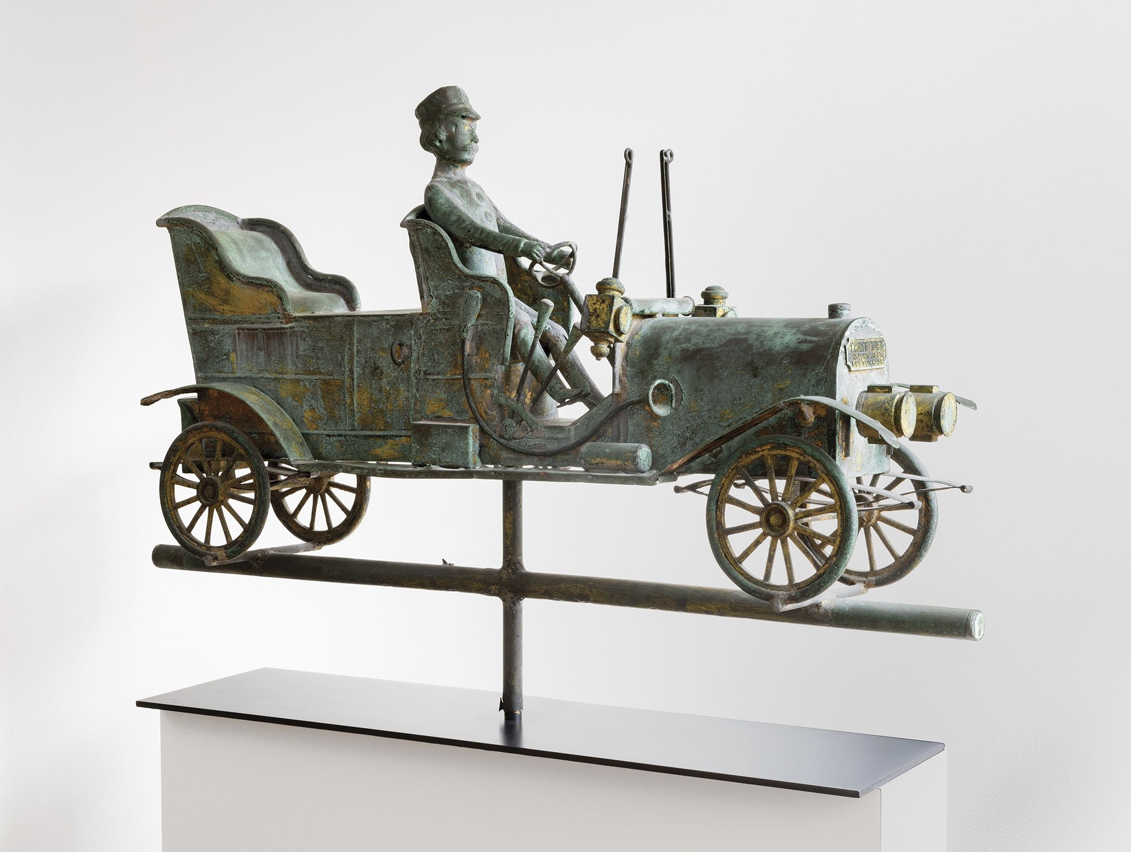 A Touring Car and Driver weather vane. (American Folk Art Museum via AP)