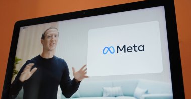 Seen on the screen of a device in Sausalito, Calif., Facebook CEO Mark Zuckerberg announces the company's new name, Meta, during a virtual event, U.S., Oct. 28, 2021. (AP Photo)