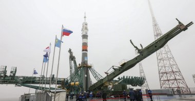 Russia&#039;s Soyuz-2.1a booster rocket with the Soyuz MS-20 space ship that will carry new crew to the International Space Station (ISS) is mounted vertically at the launch pad at the Baikonur Cosmodrome, Kazakhstan, Dec. 5, 2021. (Roscosmos Space Agency via AP)