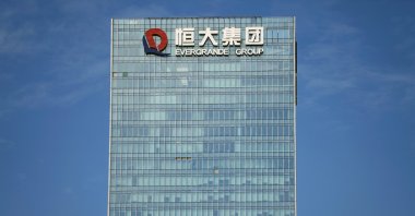 The logo of China Evergrande Group is seen on the property developer's headquarters in Shenzhen, Guangdong province, China, Sept. 26, 2021. (Reuters Photo)