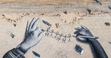 Saype’s installation for Balmain. (Photo by Funda Karayel)