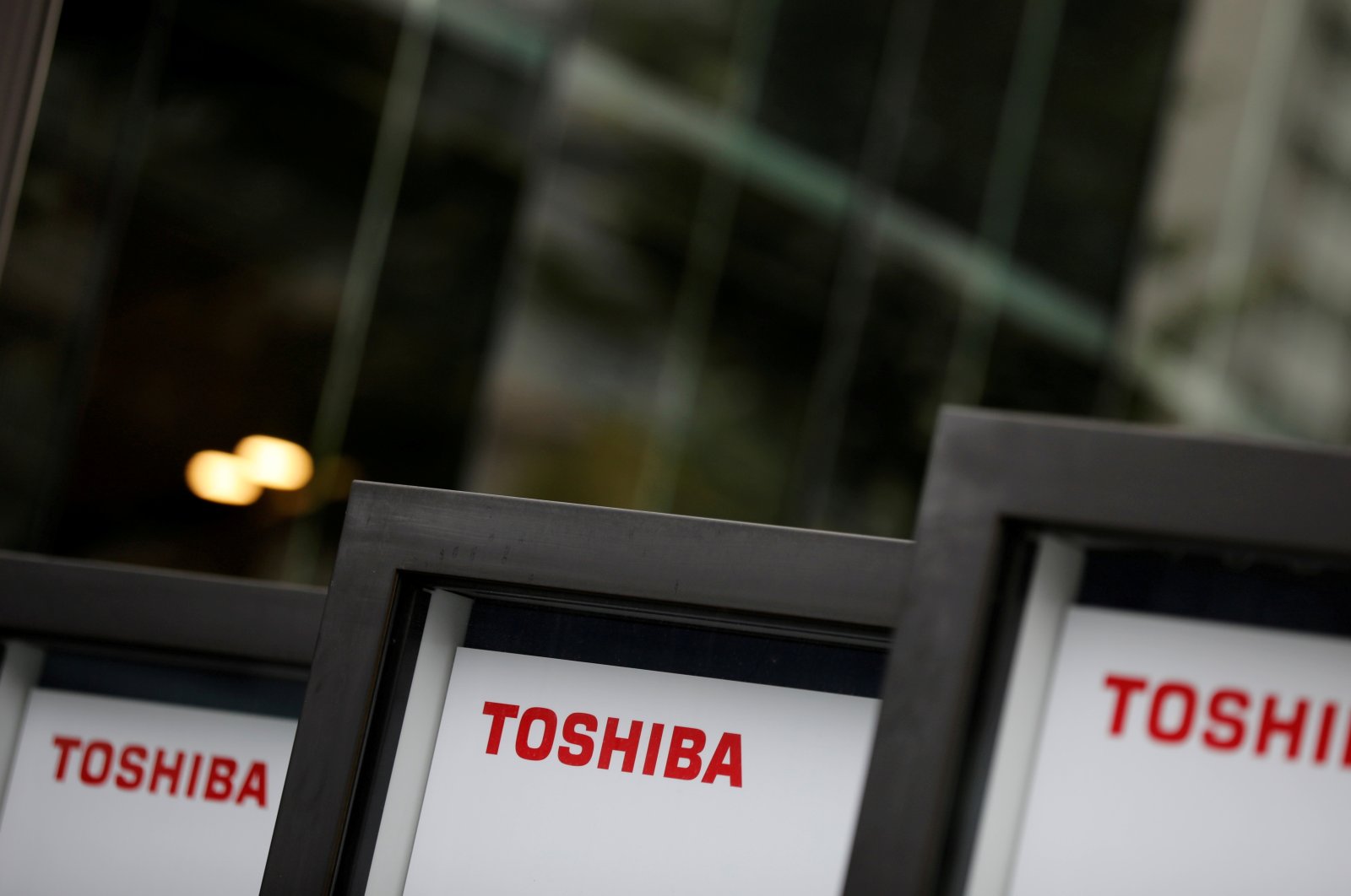 Logos  of Toshiba are pictured at a venue of the company&#039;s annual general meeting with its shareholders in Tokyo, Japan, June 25, 2021. (Reuters Photo)