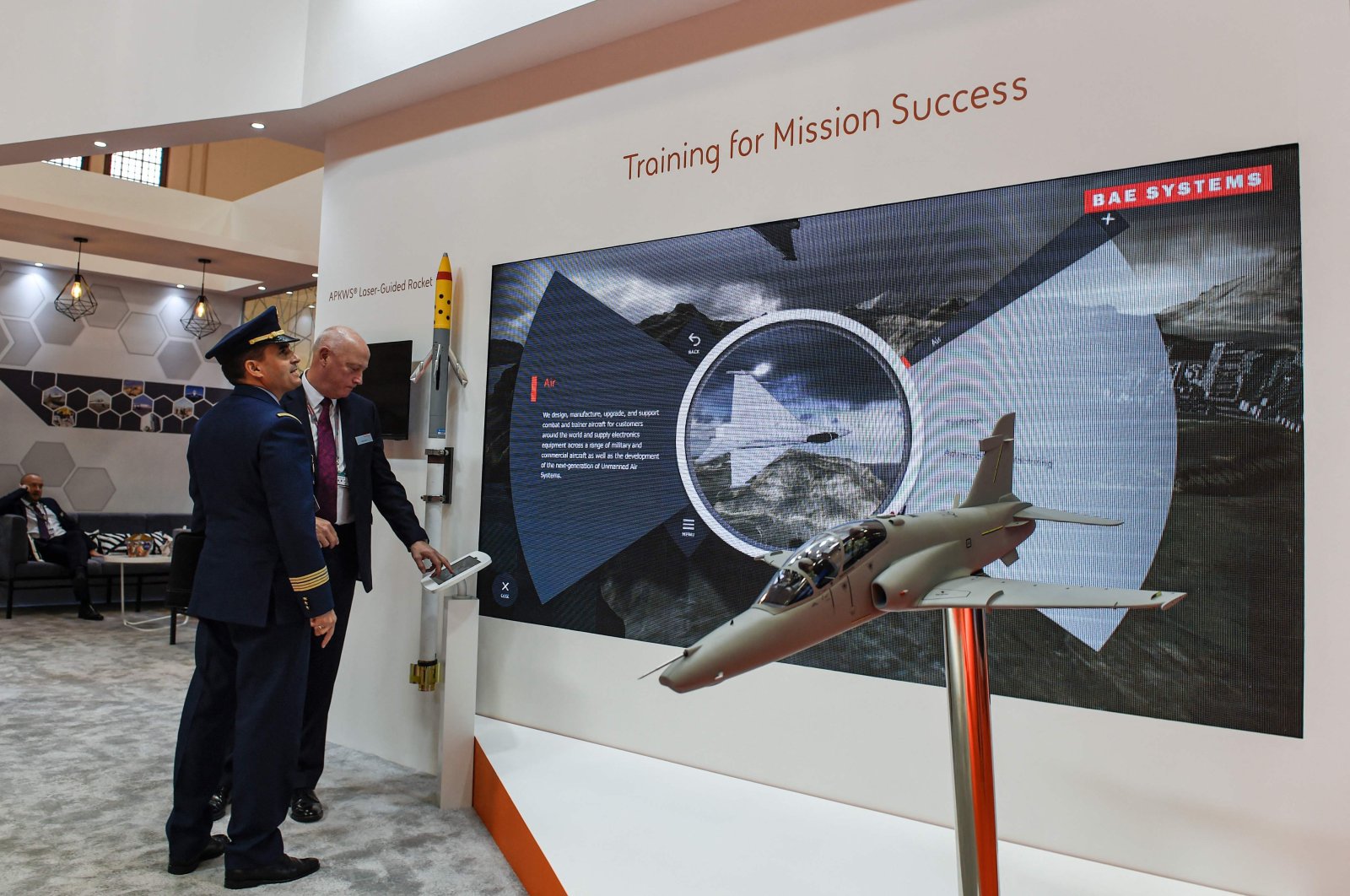 An unidentified military officer receives a briefing about pilot training solutions offered by BAE Systems at the Bahrain International Defence Exhibition &amp; Conference (BIDEC), in the capital Manama, Bahrain, Oct. 29, 2019. (AFP Photo)