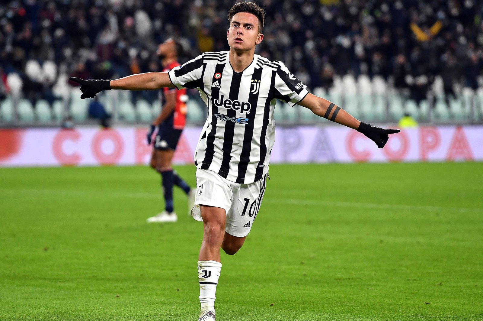 Juventus&#039; Paulo Dybala celebrates after scoring in a Serie A match against Genoa, Turin, Italy, Dec. 5, 2021. (EPA Photo)