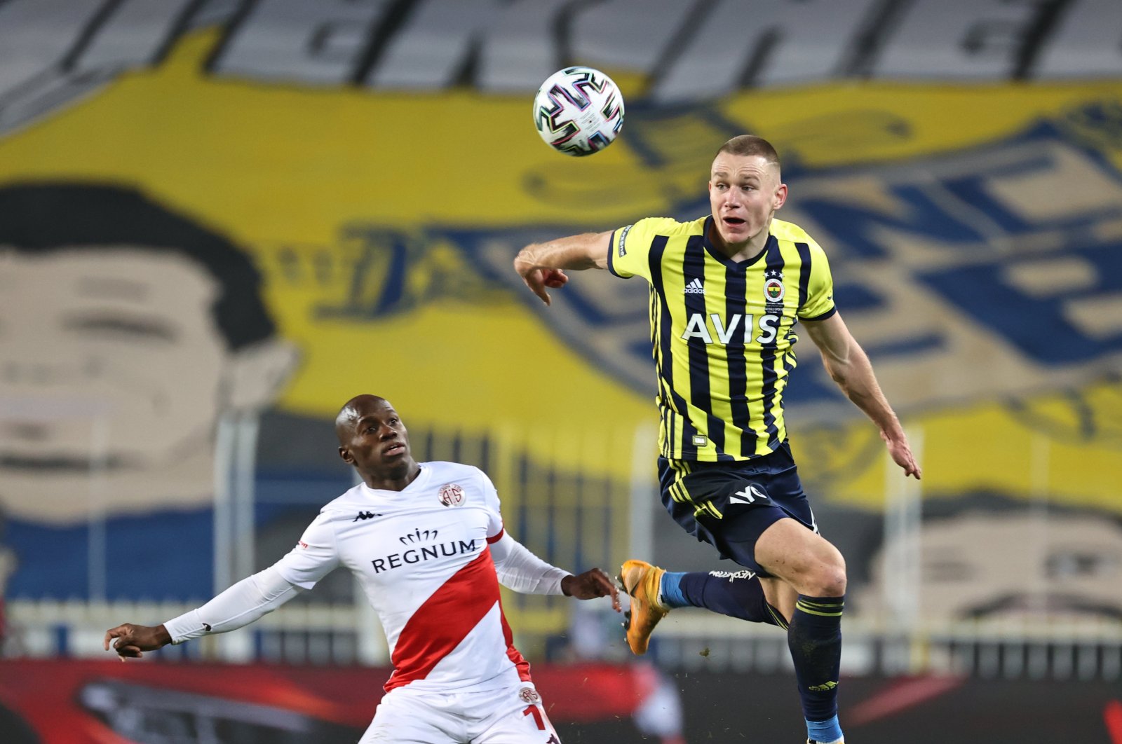 Fenerbahçe center-back Attila Szalai (R) is seen in action during a match between Fenerbahçe and Fraport TAV Antalyaspor in Istanbul, Turkey, March 4, 2021. (AA Photo)