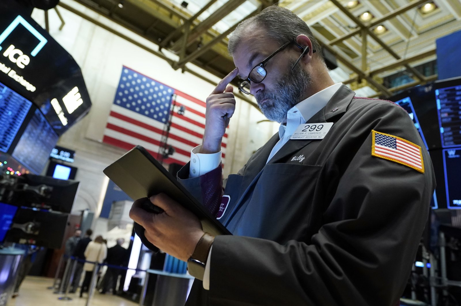 Trader William Lawrence works on the floor of the New York Stock Exchange, New York, U.S., Dec. 2, 2021. (AP Photo)