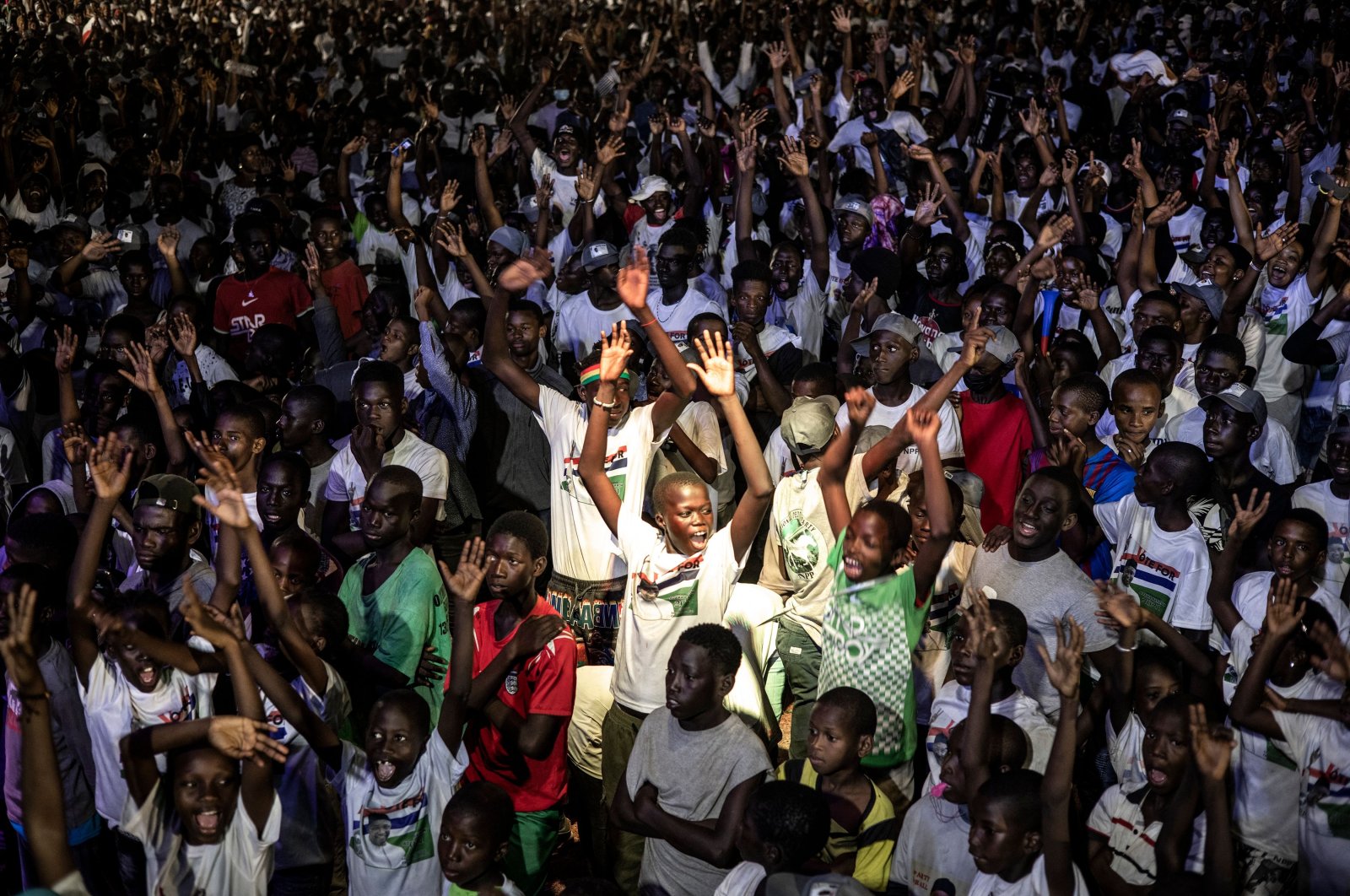 Supporters of the president of Gambia, Adama Barrow, celebrate his victory in the presidential elections in Banjul, Gambia, Nov. 5, 2021. (AFP Photo)